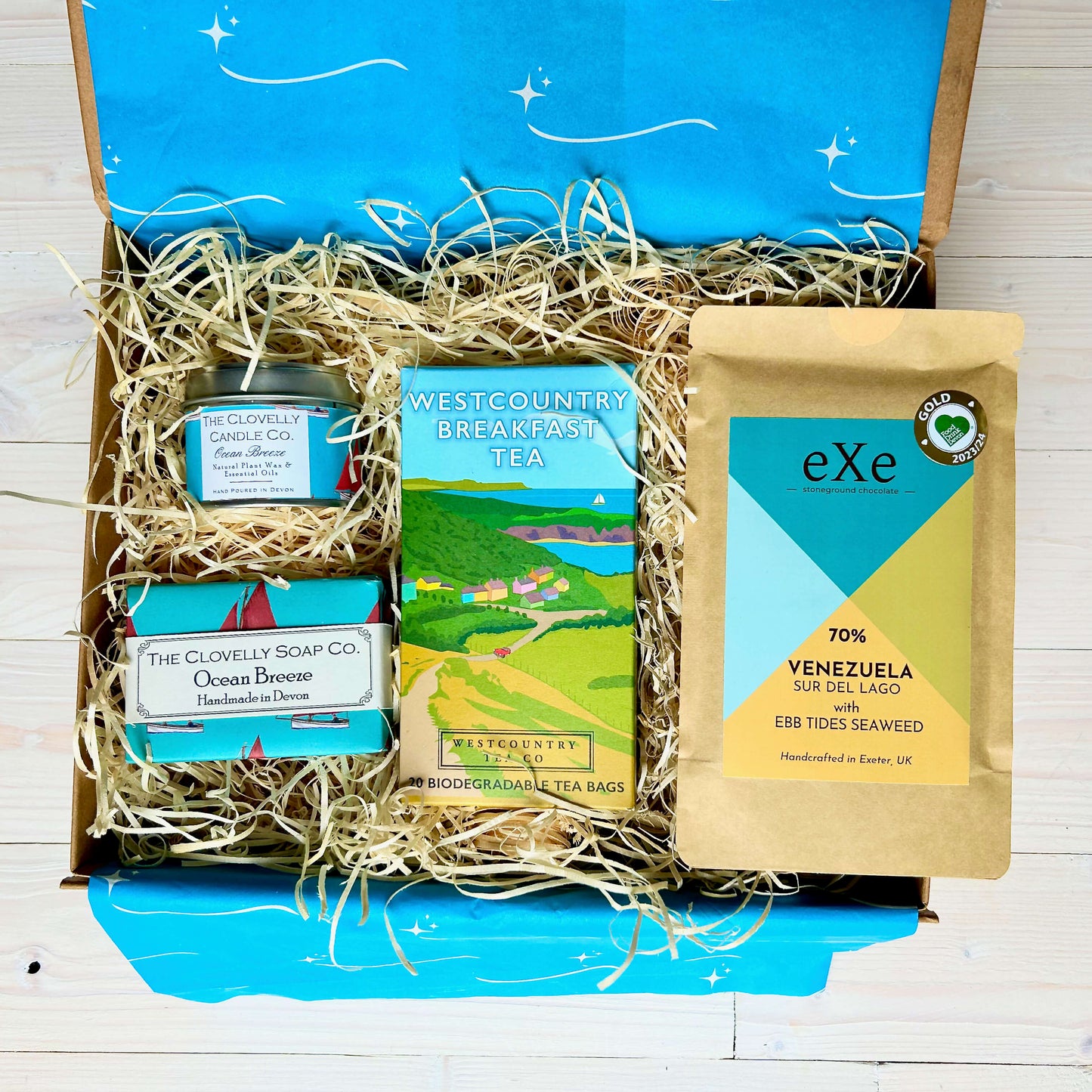 New Home Hamper with artisan Devon Gifts including chocolate, Tea, natural candle, hand-made soap - perfect housewarming gift by post