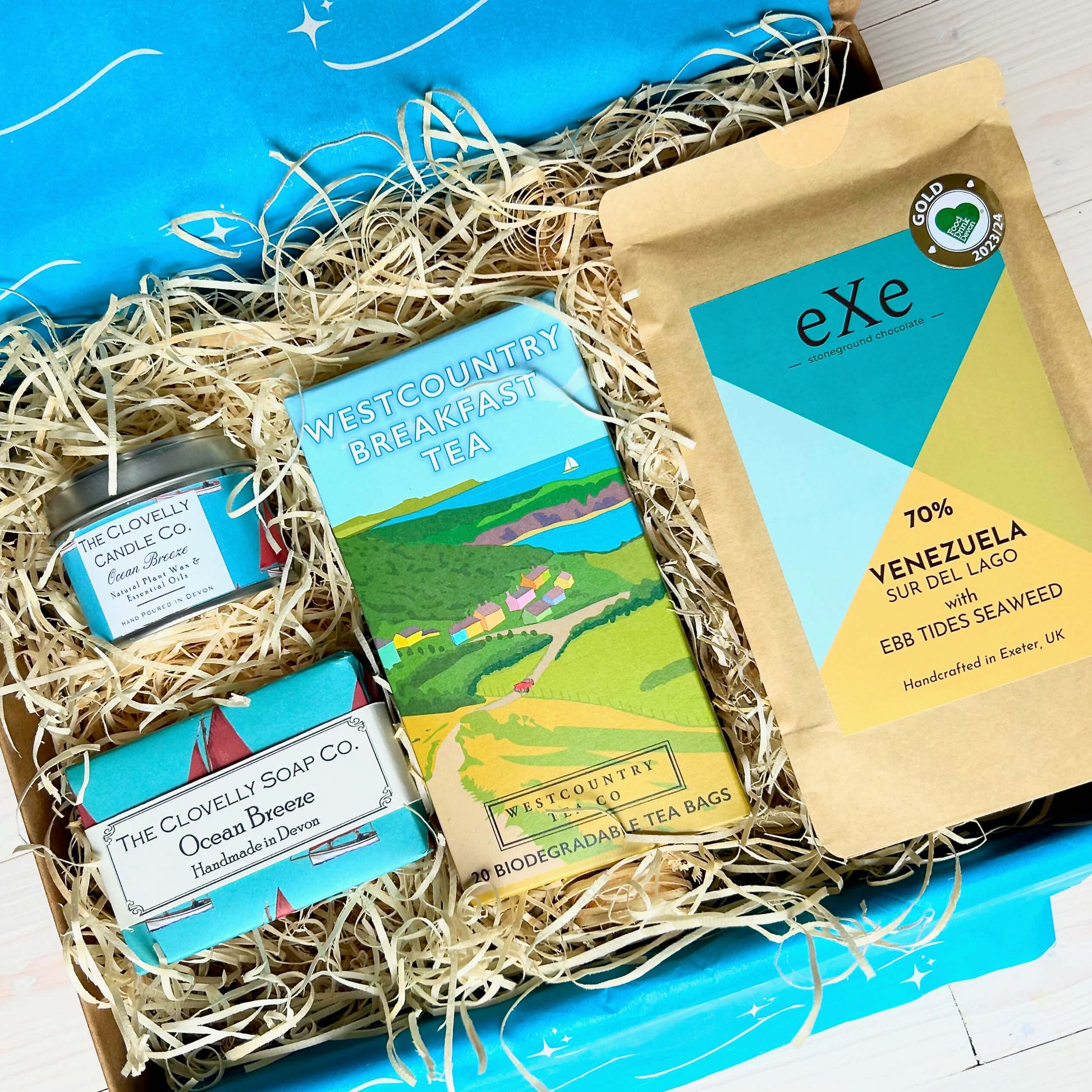 New Home Hamper with artisan Devon Gifts including chocolate, Tea, natural candle, hand-made soap - perfect housewarming gift by post