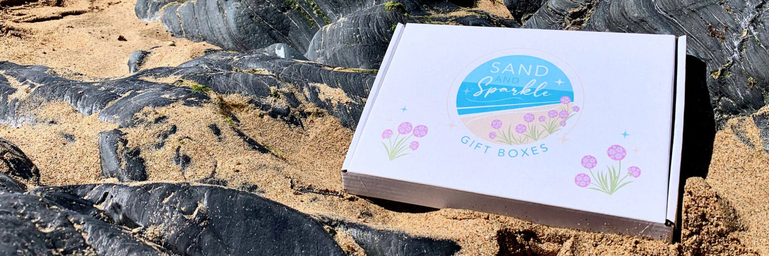 Eco Friendly Gift Boxes from Sand and Sparkle picutred on a Cornish beach